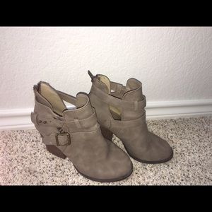 Muddy ankle boots